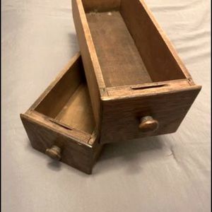 Vintage sewing machine drawers.